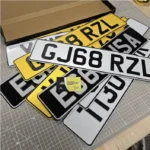 DVLA-approved replacement number plates made by JDM Plates, showing high-quality UK yellow and white plate finishes.