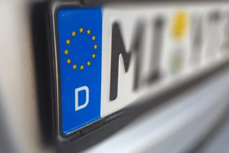  Zoomed-in view of German licence plate with EU stars and country identifier D on blue strip