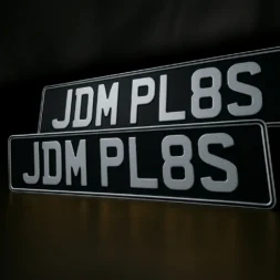 Pressed Metal Black and Silver Number Plates