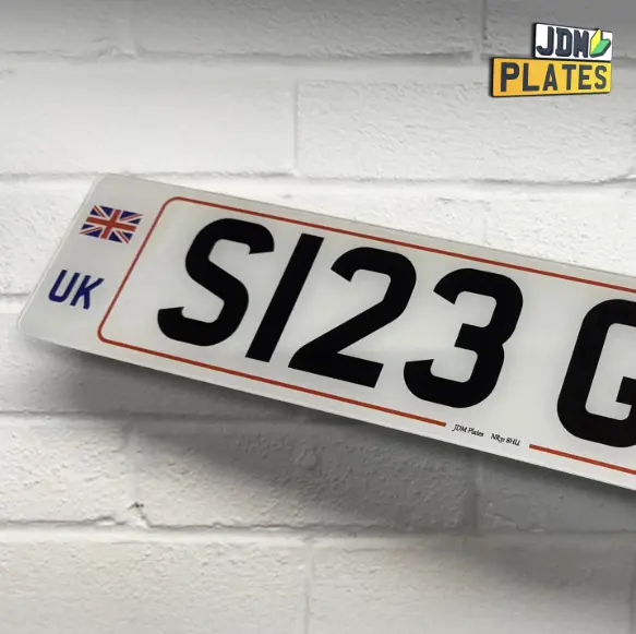 Replacement UK car number plate by JDM Plates, featuring Union Jack and DVLA-compliant design.